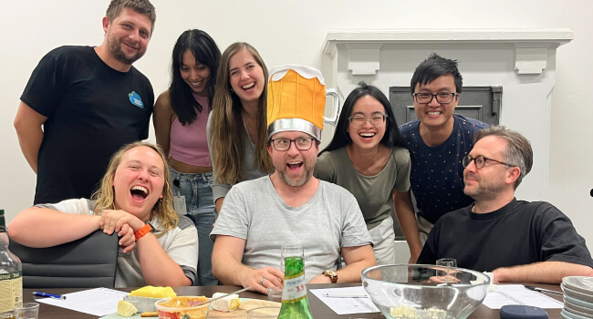 NurtureCloud team having fun at a trivia night event