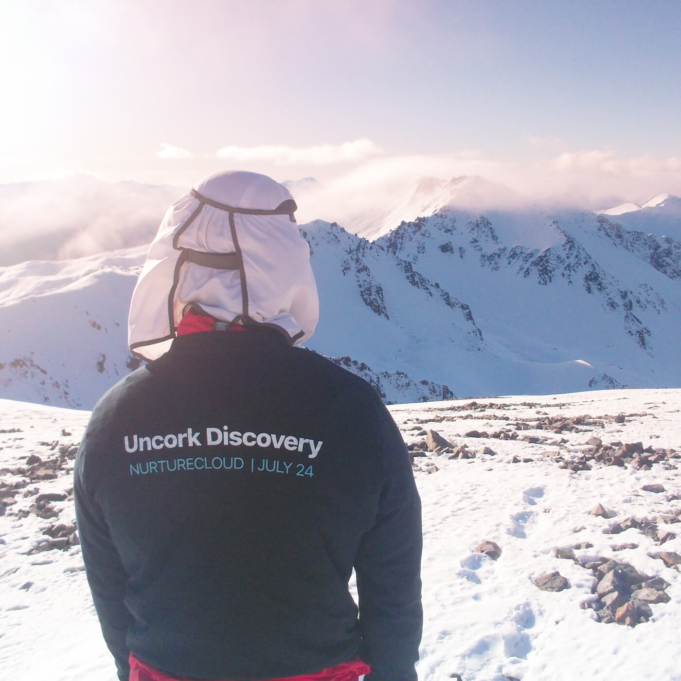 NurtureCloud's Winson at the top of a mountain