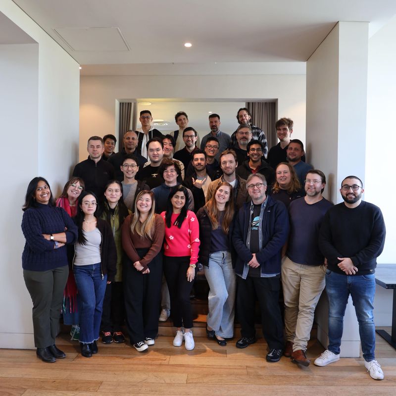 A NurtureCloud team group photo during a Las Vegas-themed hackathon event